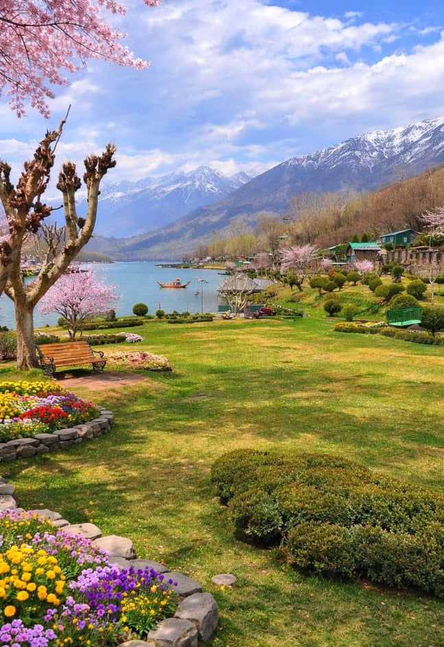 A lakeside garden with mountain views at Manasbal.